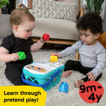 Baby Einstein and Hape Magic Touch Shopping Basket toy with wooden food shapes