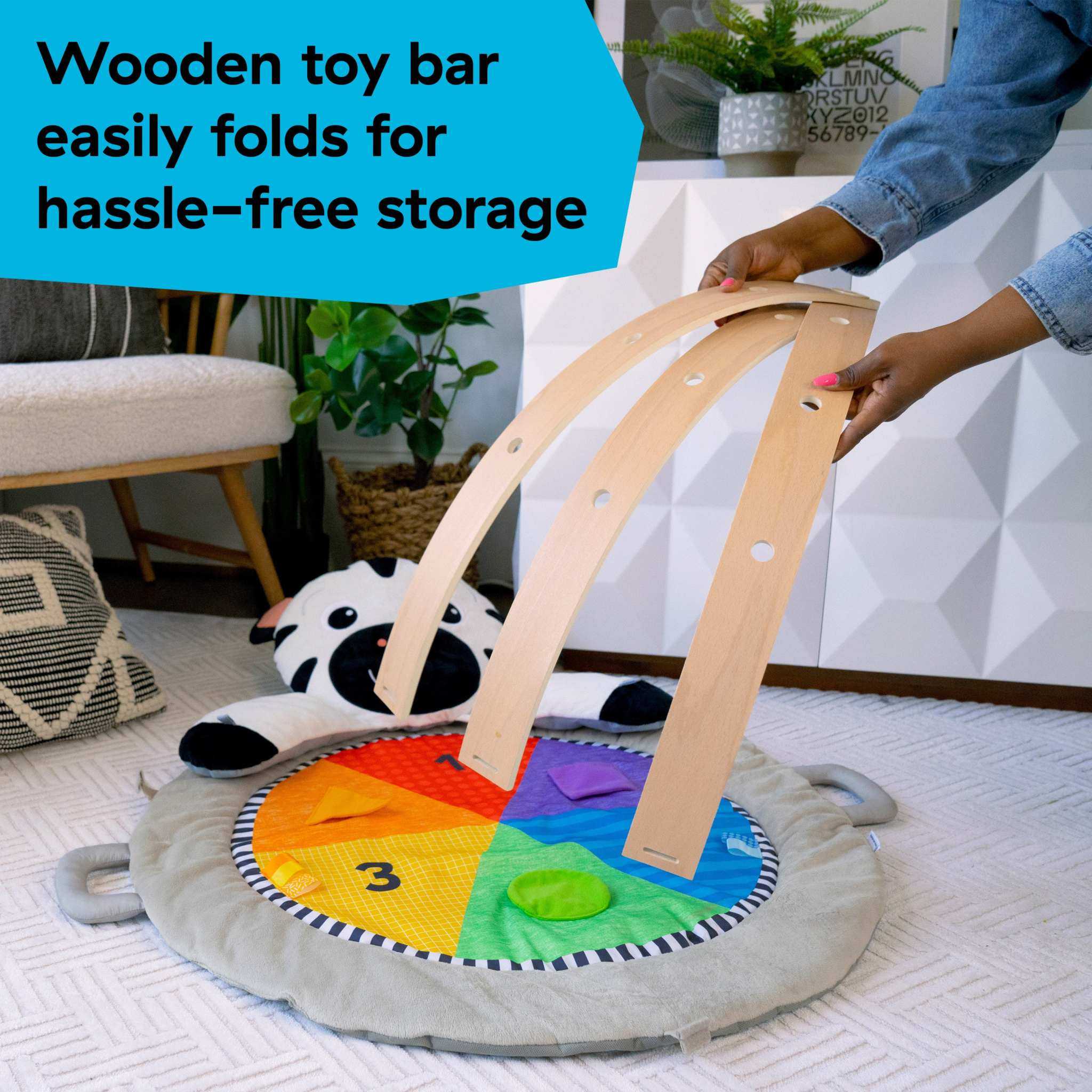Baby Einstein Zen's Activity Milestones Plush Gym with wooden bar and sensory toys for infants