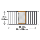 Ingenuity The Thruway 60XW Series pet and baby gate with honey oak frame and geometric metal design