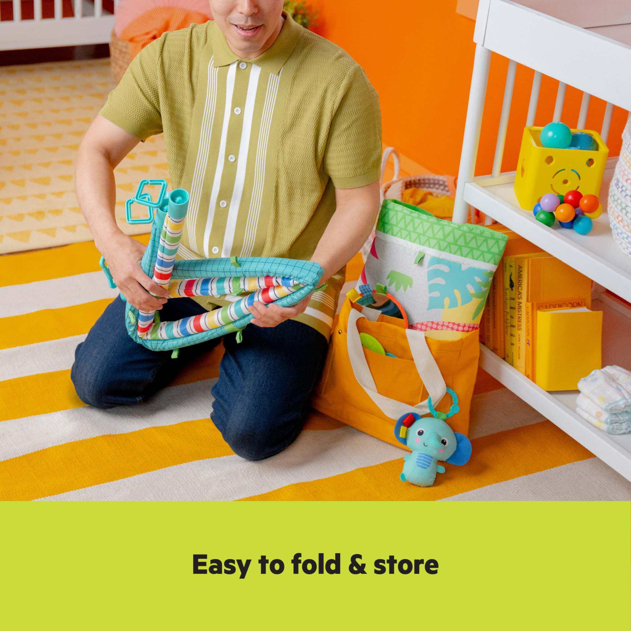 Bright Starts Wild Wiggles jungle-themed baby activity gym with musical elephant and removable toys on green play mat