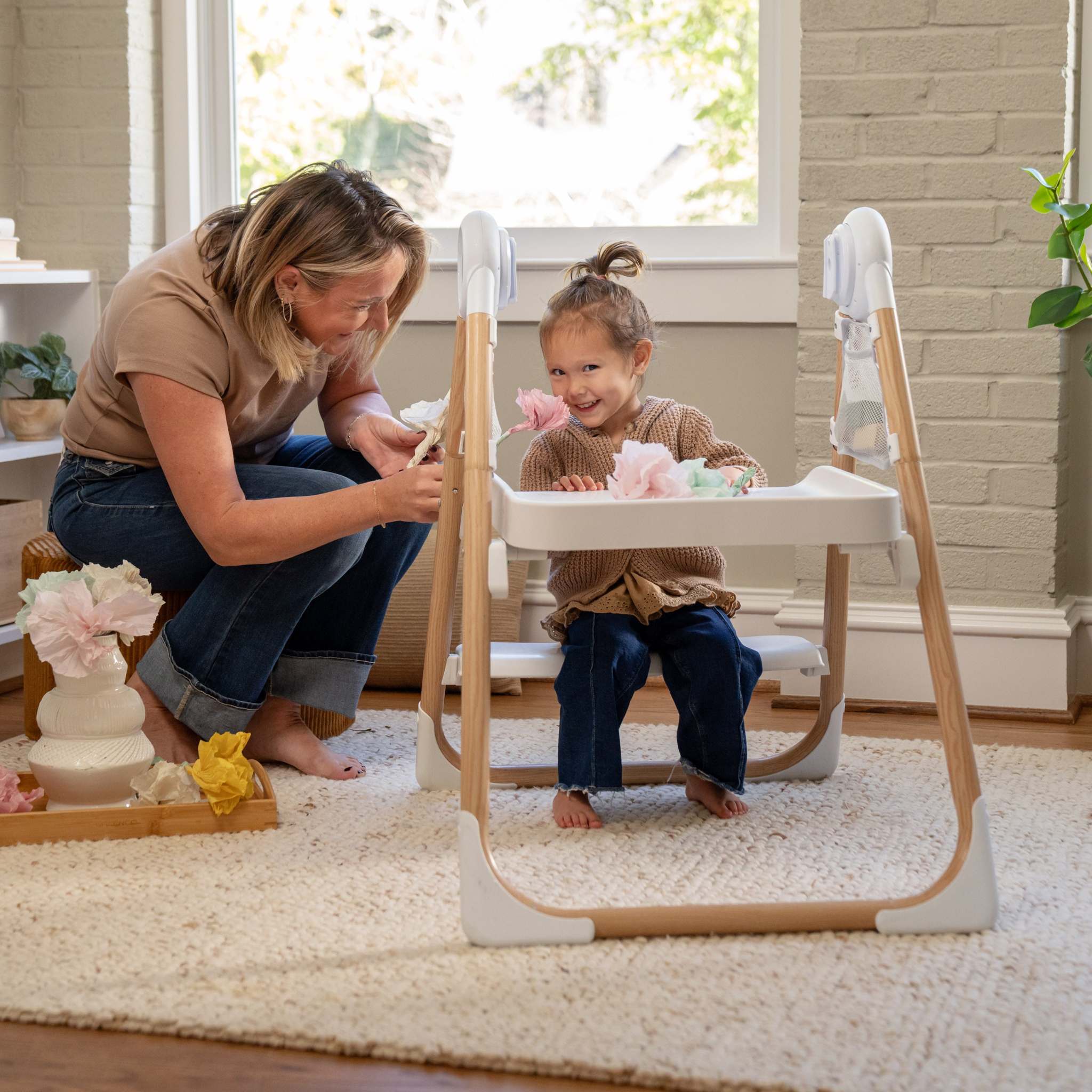 Ingenuity Table to Tower 2-in-1 step stool for toddlers with adjustable safety rail and activity desk conversion