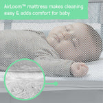Ingenuity Dream and Grow bedside bassinet with mesh sides and storage pockets