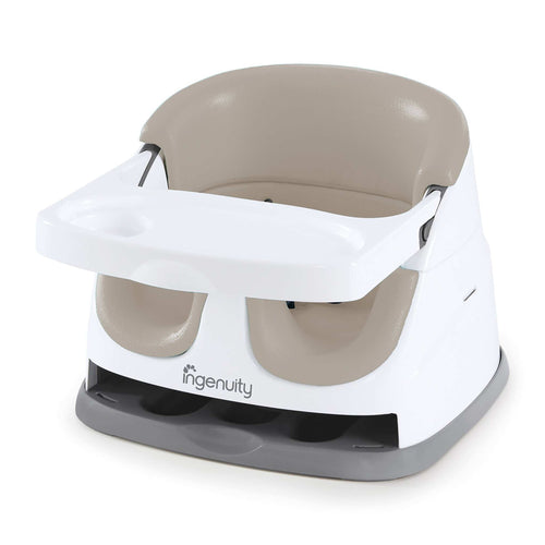 Ingenuity Baby Base 2-in-1™ Seat in slate color attached to dining chair with removable tray and foam insert for babies and toddlers