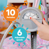 Bright Starts Pink Paradise Portable Swing with 2 interactive toys and adjustable recline for baby comfort and safety