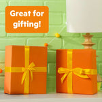 Bright Starts Safari Sounds Gift Set wrapped as colorful orange baby shower gifts with yellow ribbons
