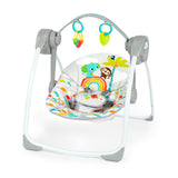 Playful Paradise Portable Swing with colorful design, interactive toys, and foldable frame.