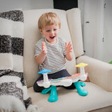 boy playing with together in tune drums connected magic touch drum set