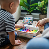 baby playing with together in tune duo connected magic touch instrument set