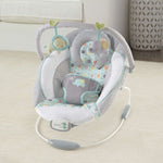 Ingenuity Soothing Baby Bouncer Morrison with plush fabrics, soothing vibrations, melodies, removable toy bar, and cushioned support