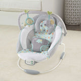 Ingenuity Soothing Baby Bouncer Morrison with plush fabrics, soothing vibrations, melodies, removable toy bar, and cushioned support