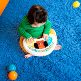 Bright Starts Tiny Trek Walker 2-in-1 baby walker with jungle vines design and interactive piano toy