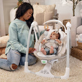 Ingenuity ConvertMe Swing-2-Seat Wynn baby swing with plush seat and toy bar