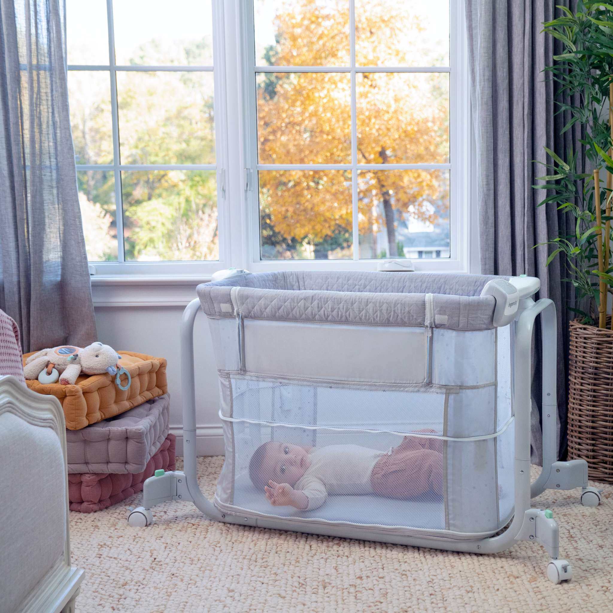 Ingenuity Dream Hero 3-in-1 grey co-sleeping bassinet with breathable mesh sides