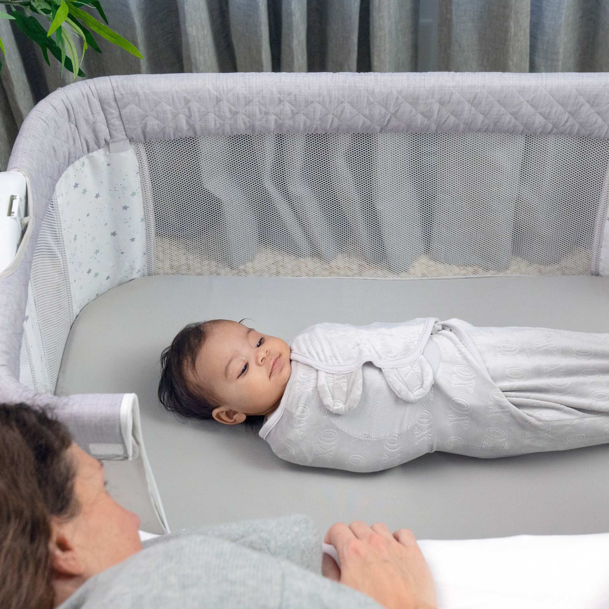 Ingenuity Dream Hero 3-in-1 grey co-sleeping bassinet with mesh sides