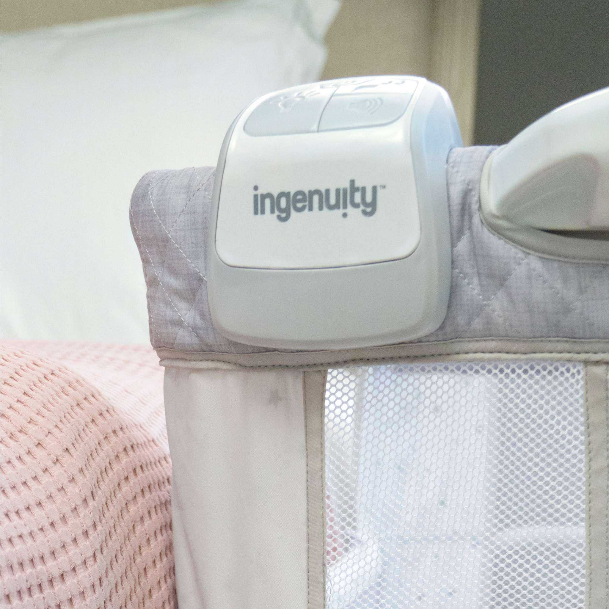 Ingenuity Dream Hero 3-in-1 co-sleeping bassinet in grey with breathable mesh sides and adjustable height
