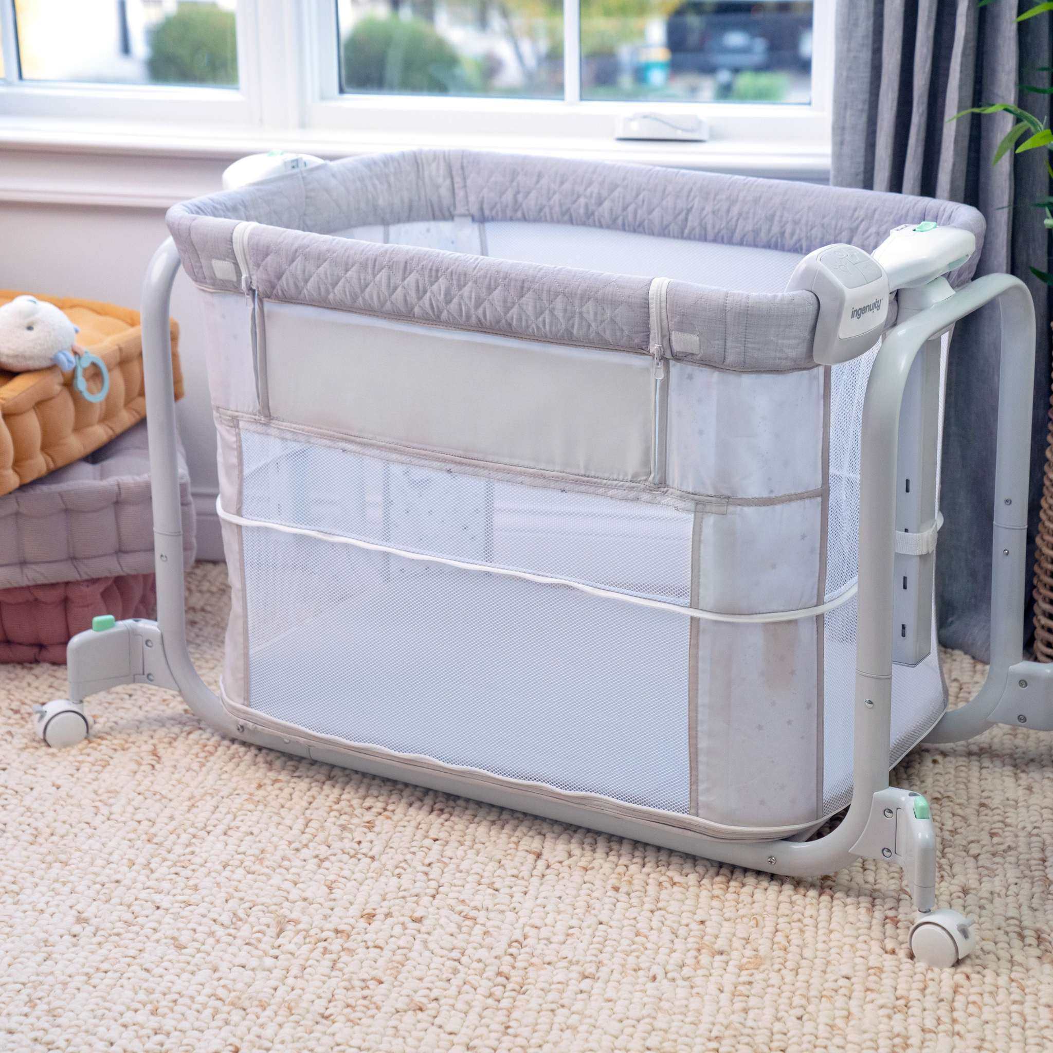 Ingenuity Dream Hero 3-in-1 co-sleeping bassinet in grey with breathable mesh sides