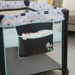 Ingenuity smart and simple travel cot with bassinet and changing table