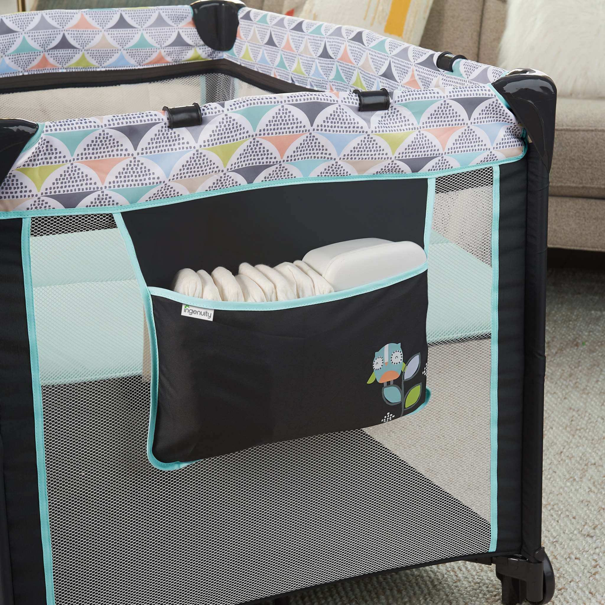 Ingenuity smart and simple travel cot with bassinet and changing table