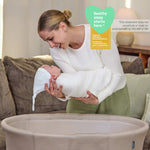 Ingenuity Snooze & Stow easy-folding baby bassinet in sand color