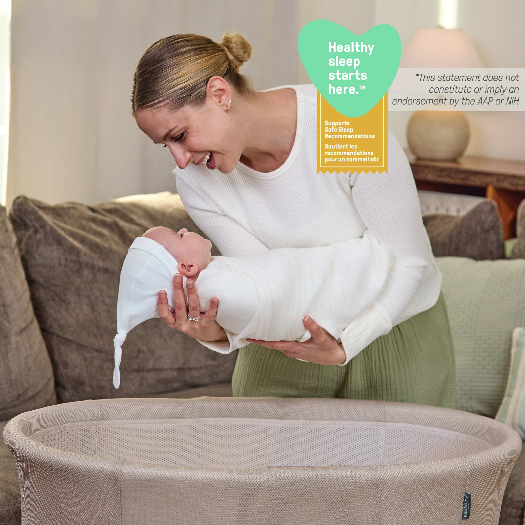 Ingenuity Snooze & Stow easy-folding baby bassinet in sand color