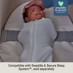 Ingenuity Snooze & Stow easy-folding bassinet with sound light vibration