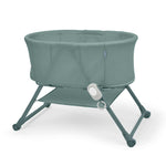 Ingenuity Snooze & Stow easy-folding baby bassinet with sound light vibration