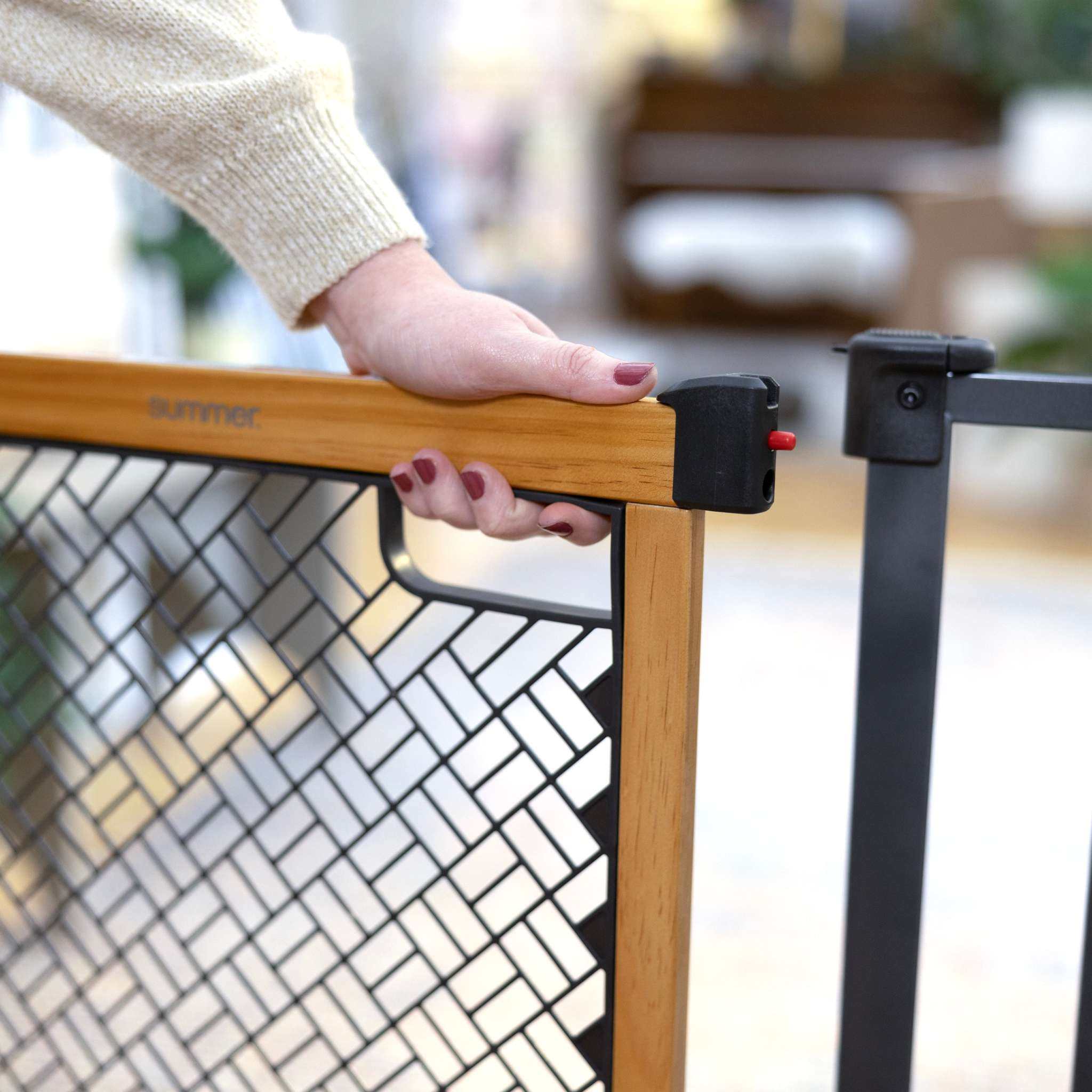Ingenuity Thruway 60XW Series pet and baby safety gate with honey oak frame