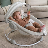 baby in a inlighten bouncer - nate