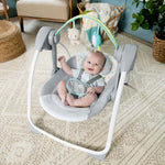 Comfort 2 Go Portable Swing with plush forest toys and soothing music for babies