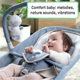 baby in a happy belly rock-to-bounce massage seat - chambray