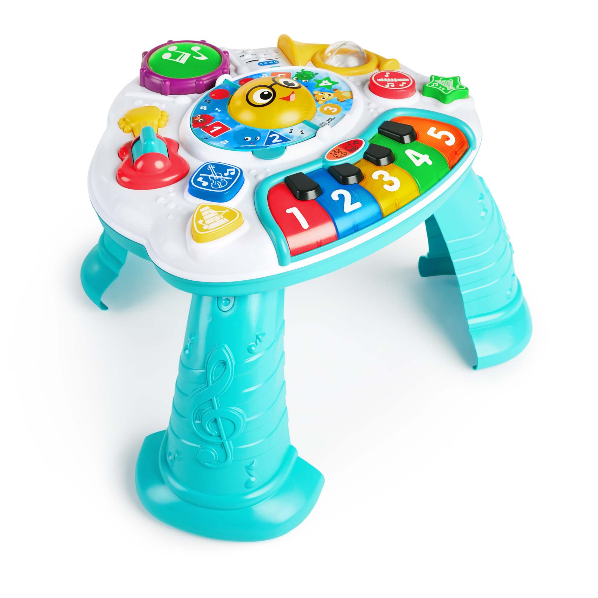 Baby playing with the Discovering Music Activity Table featuring piano, drum, guitar, and French horn instruments