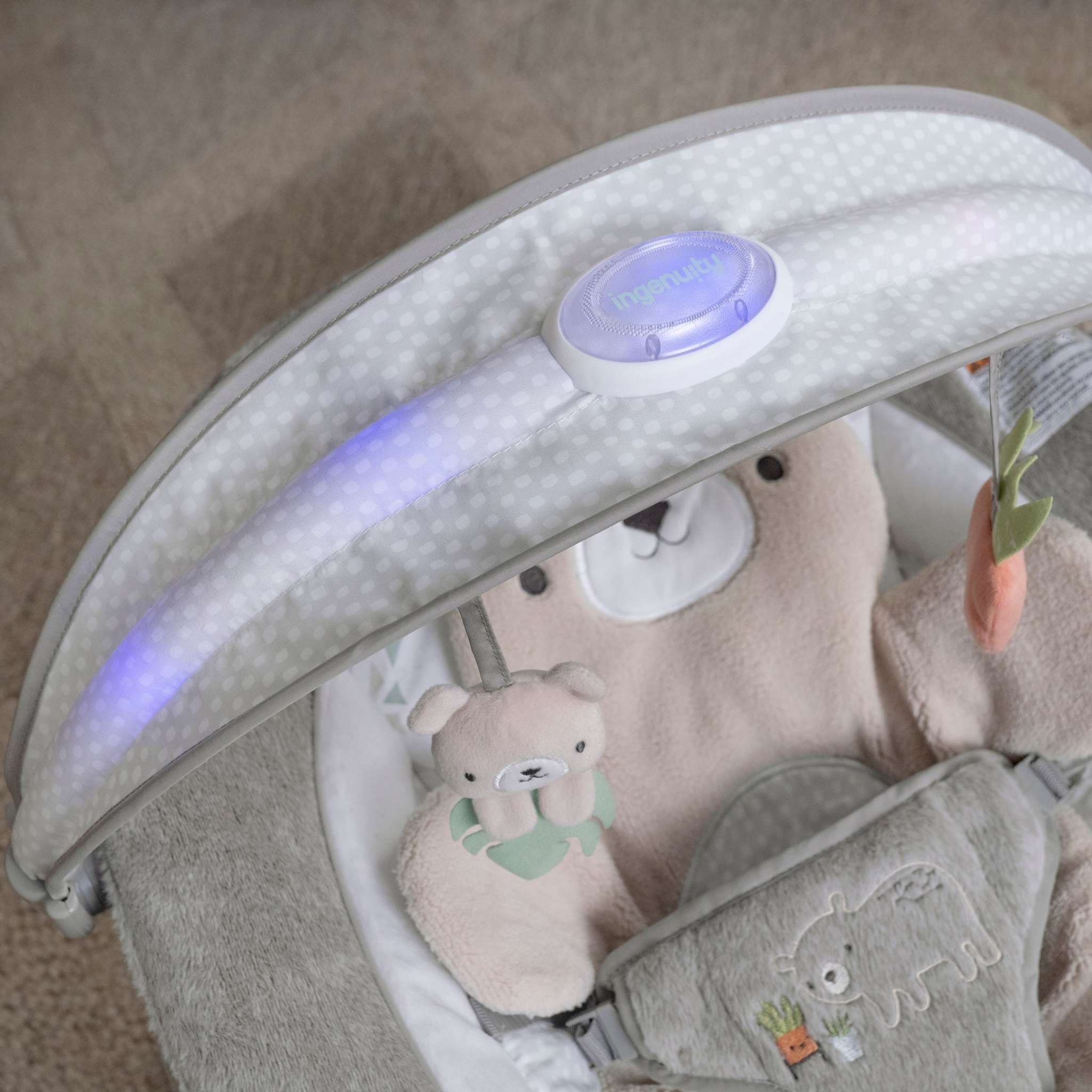 baby in a inlighten bouncer - nate