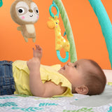 baby in a hug ‘n cuddle activity gym