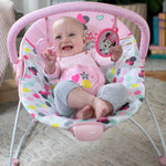 Minnie Mouse Spotty Dotty Vibrating Bouncer with pink polka dots and attached Minnie toys for baby girls