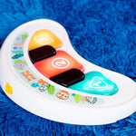 Bright Starts Tiny Trek Walker 2-in-1 jungle-themed baby walker with piano and music features