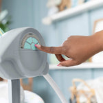 Comfort 2 Go Portable Swing with plush forest toys and soothing music for babies on the go