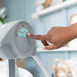 Comfort 2 Go Portable Swing with plush forest toys and soothing music for babies on the go