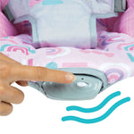 Bright Starts pink vibrating baby bouncer with interactive toys and safety harness