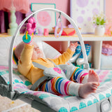 baby in rosy rainbow infant to toddler rocker