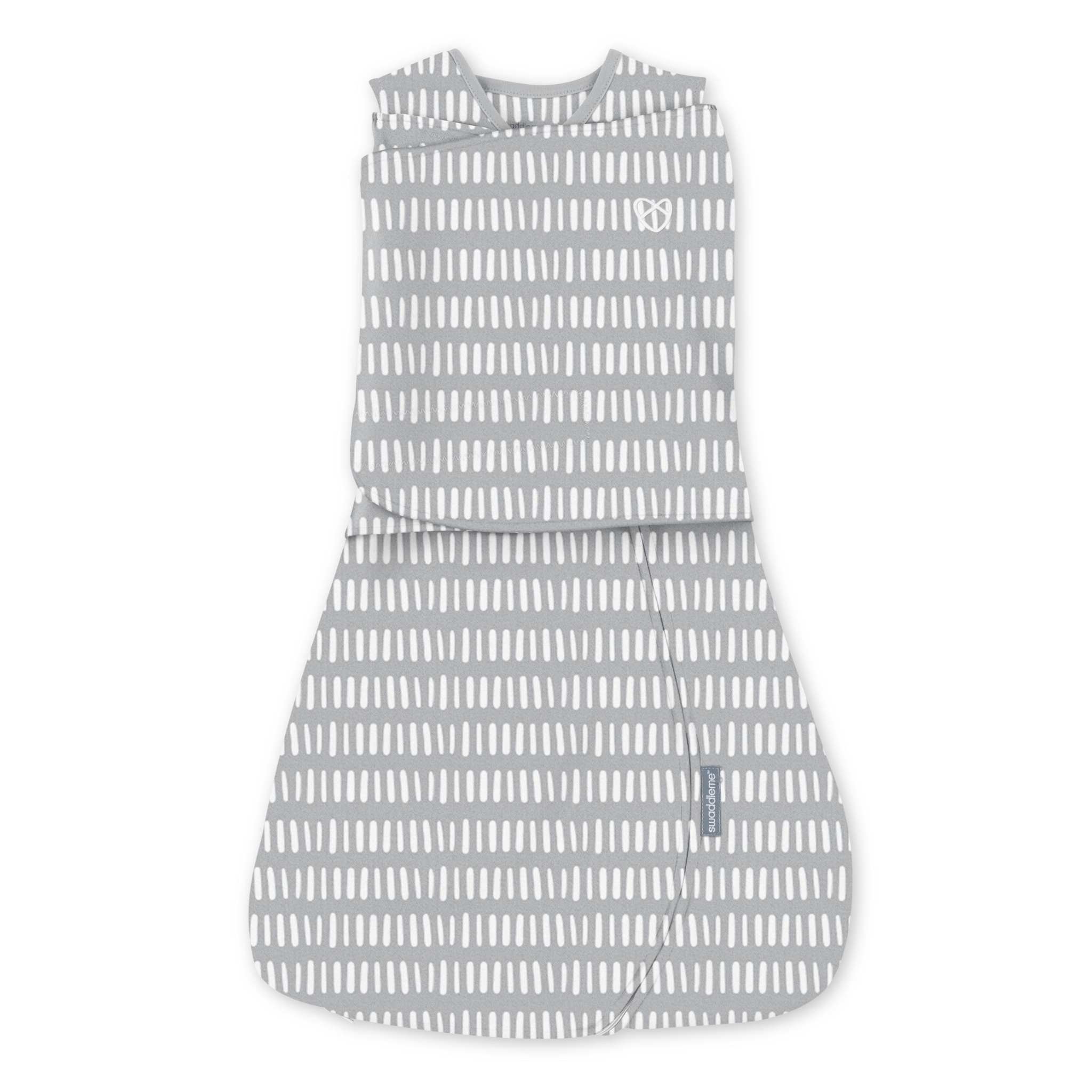 SwaddleMe by Ingenuity arms free convertible baby swaddle for 3-6 months with dashed lines pattern