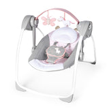Comfort 2 Go Portable Swing in pink with unicorn and butterfly toys for baby girls