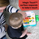 child playing with magic touch cash register pretend to check out toy