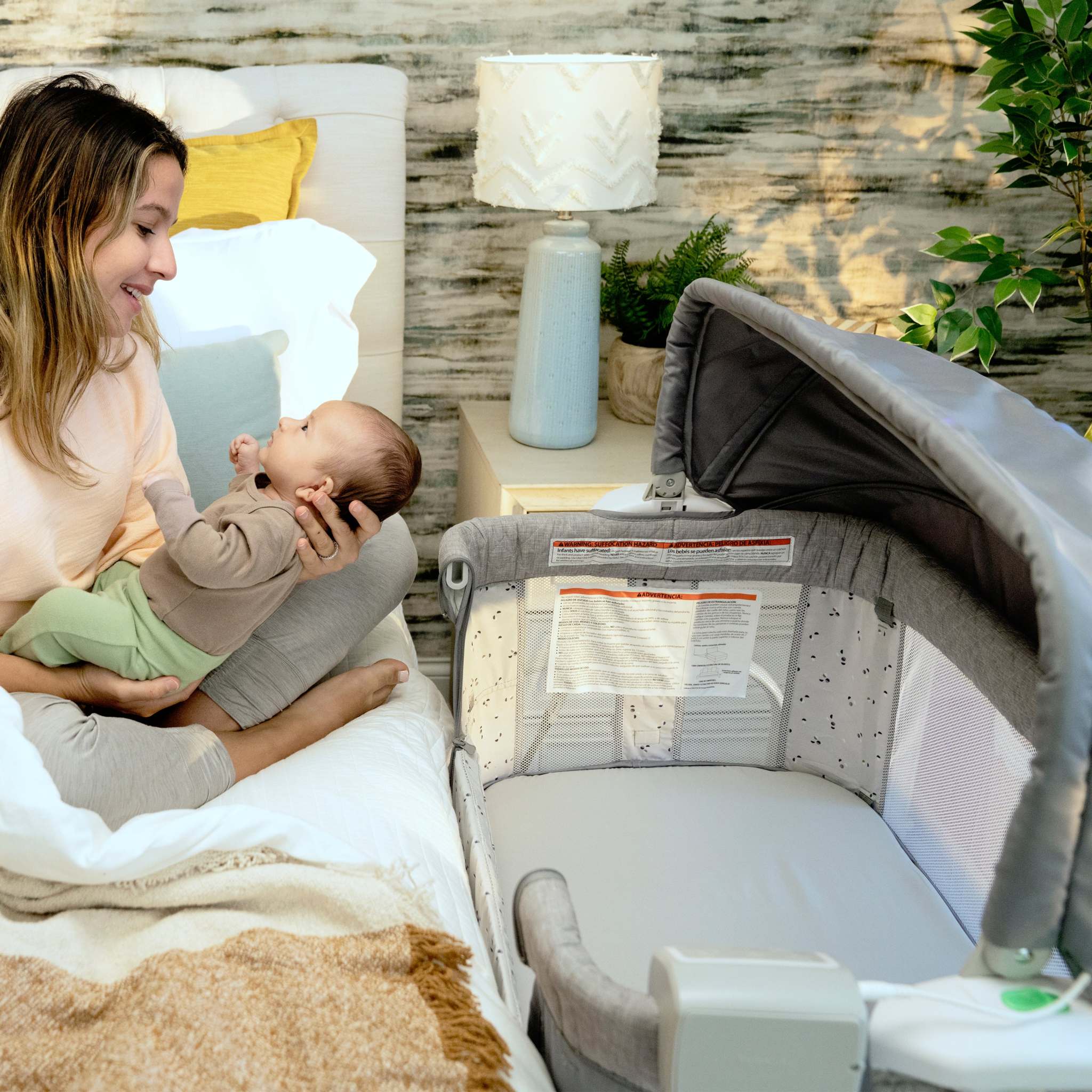 Dream Hero Starlight 3-in-1 co-sleeping bassinet with twinkling canopy, breathable mesh, and adjustable height for newborns up to 12 months