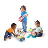 kids playing with together in tune drums connected magic touch drum set