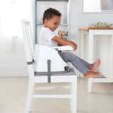 child in a baby base 2-in-1 seat – peony