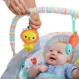 baby playing in whimsical wild comfy bouncer